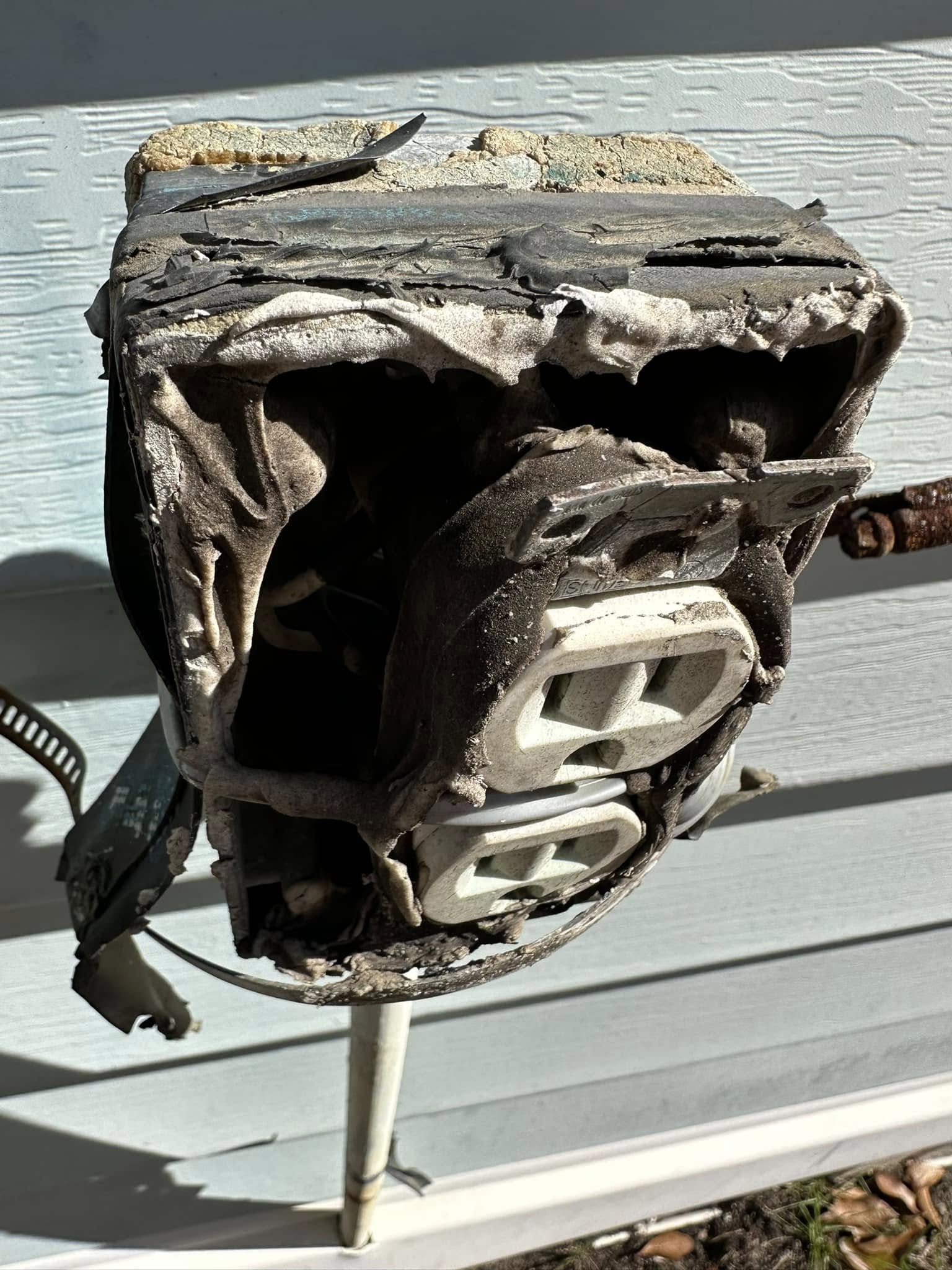This burnt receptacle is why inspections matter