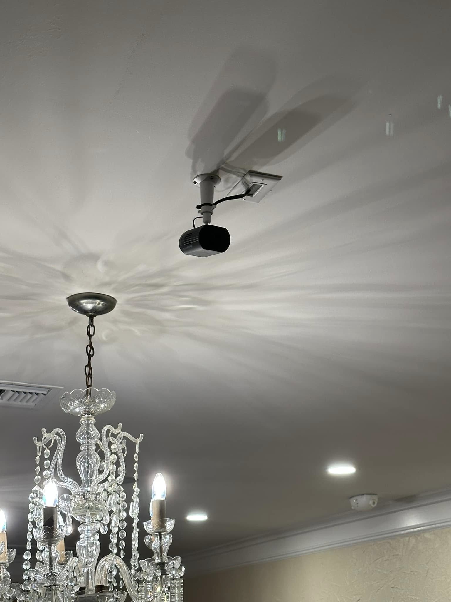 Chandelier + projector — clean ceiling work