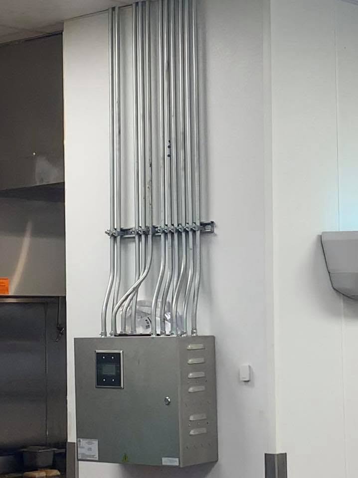 Conduit array running to panel