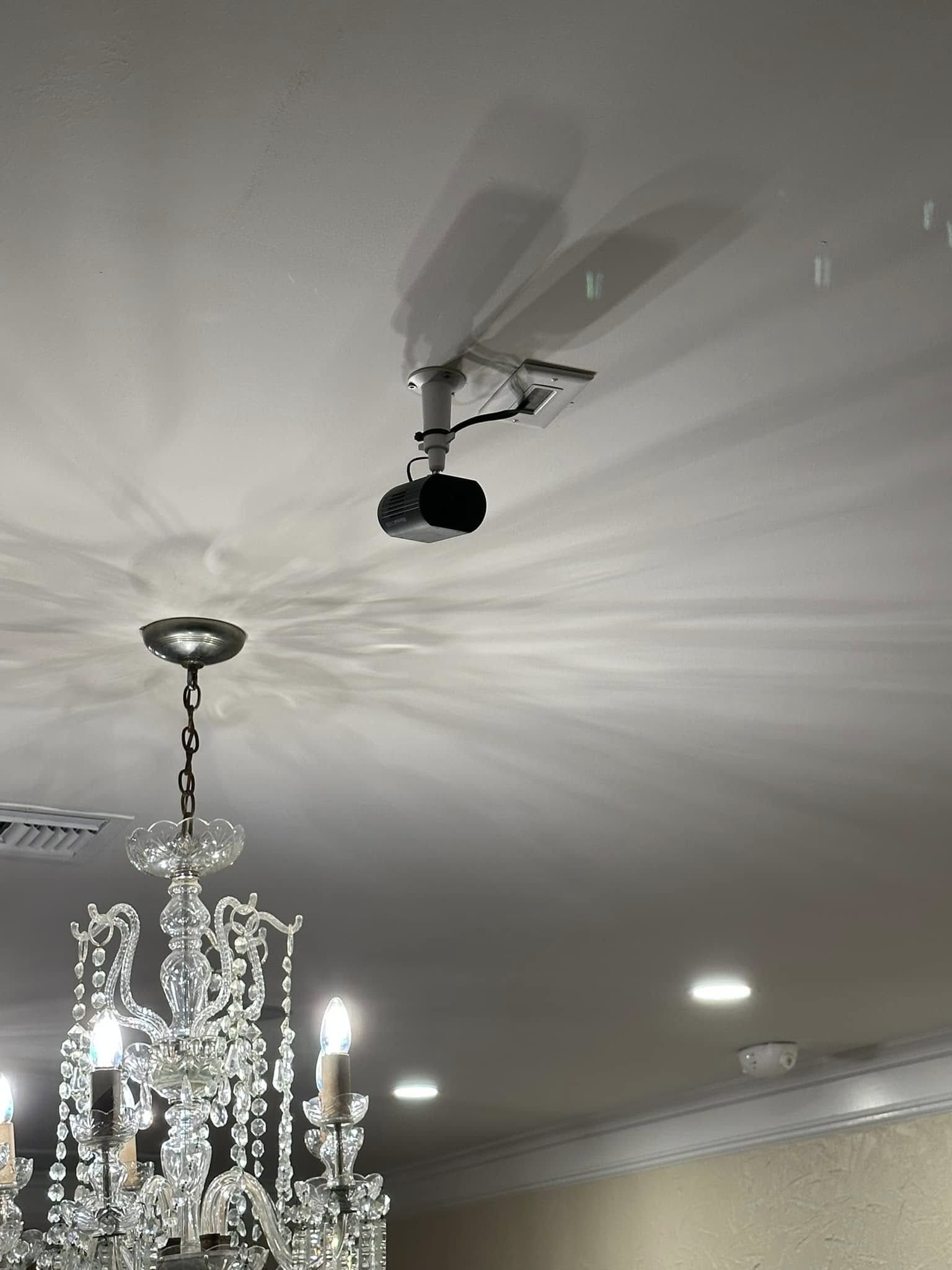 Chandeliers, can lighting and cameras installed
